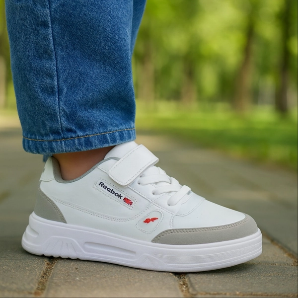 کفش اسپرت بچگانه چسبی ریبوک بهگام